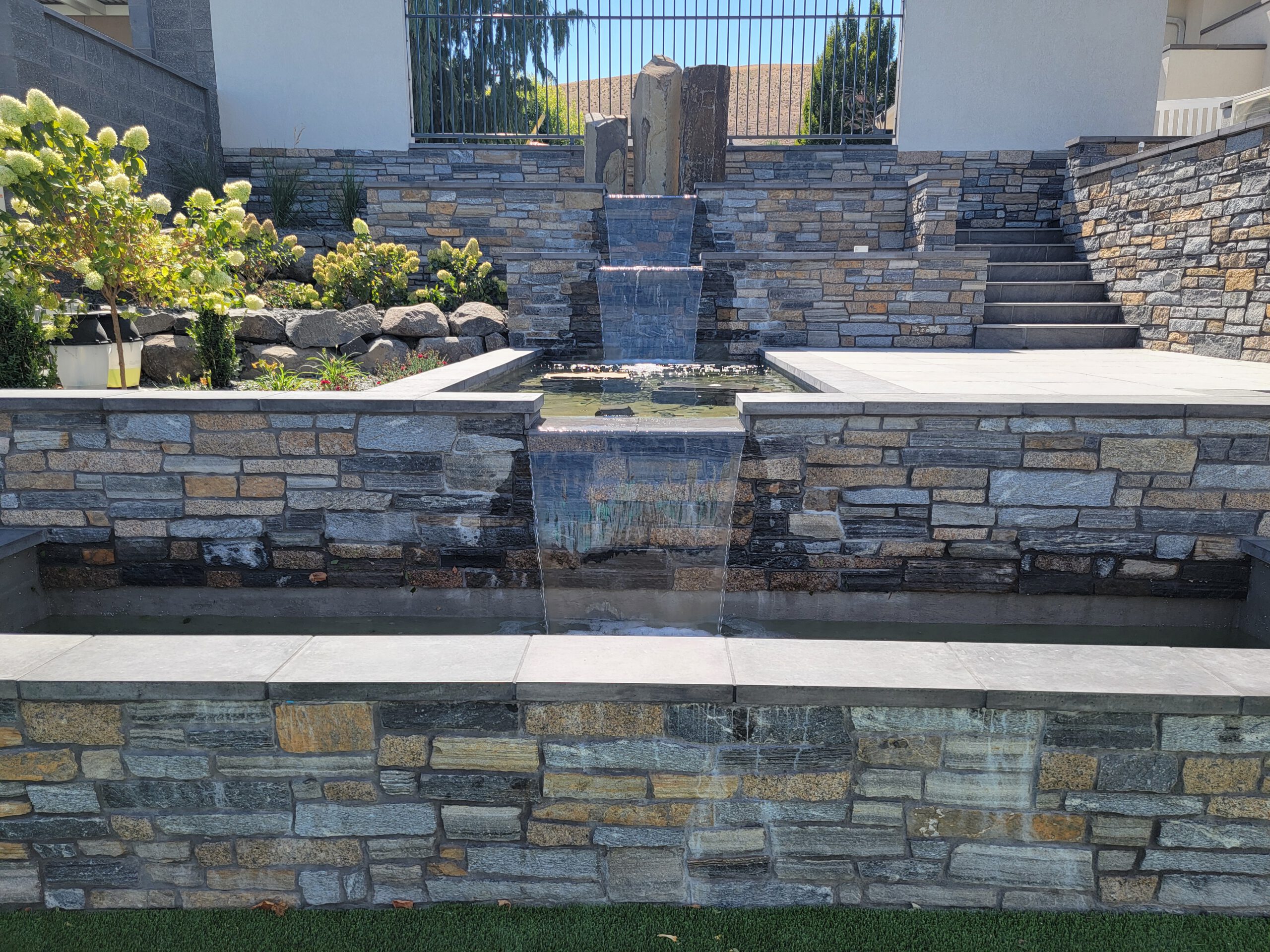 Custom all-tile pool at Water Features, a custom pool built in Eastern Washington, WA by Outdoor Elements Northwest