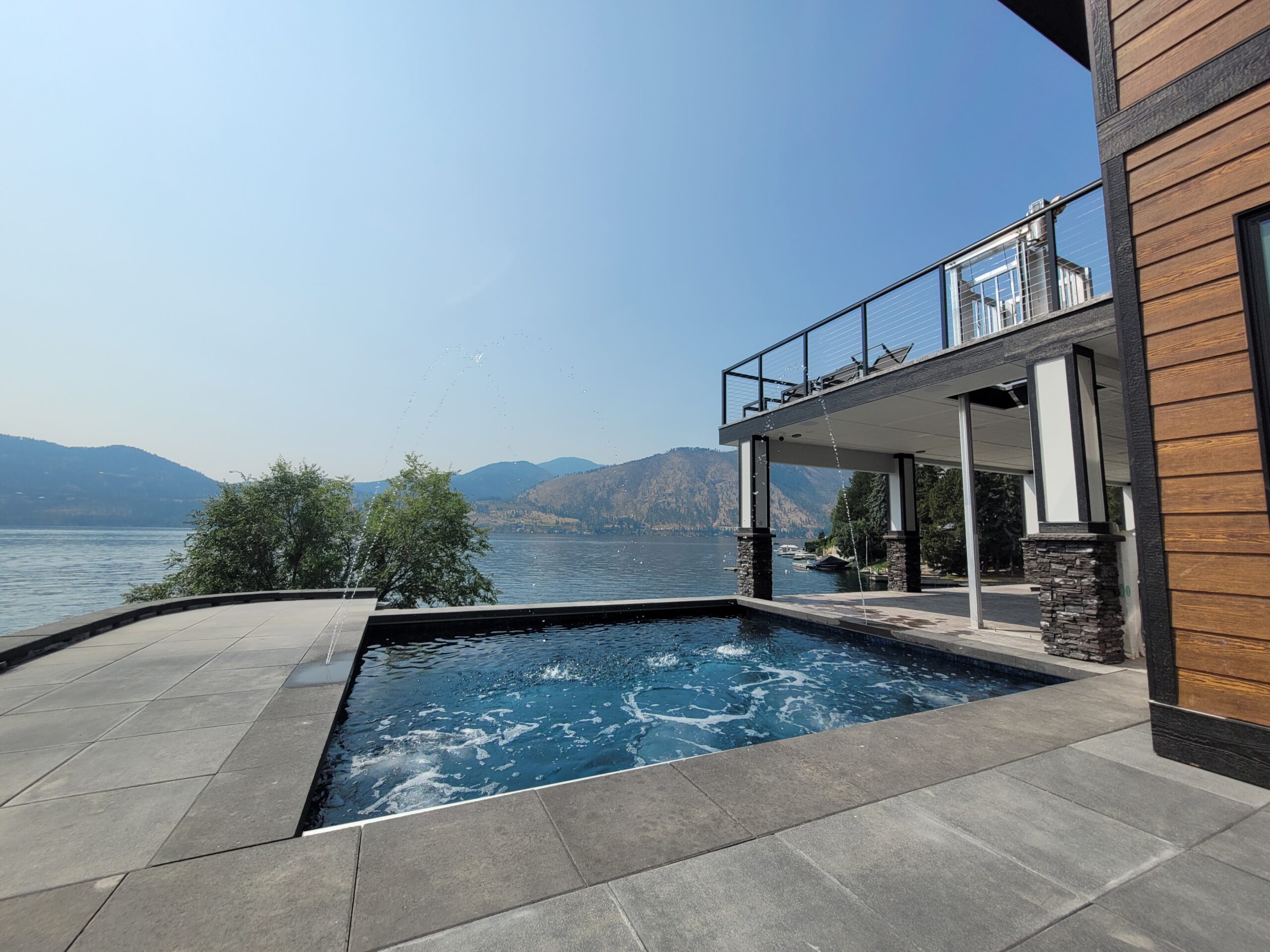 Custom all-tile pool at Lake Chelan Pool Views, a custom pool built in Manson, WA, WA by Outdoor Elements Northwest